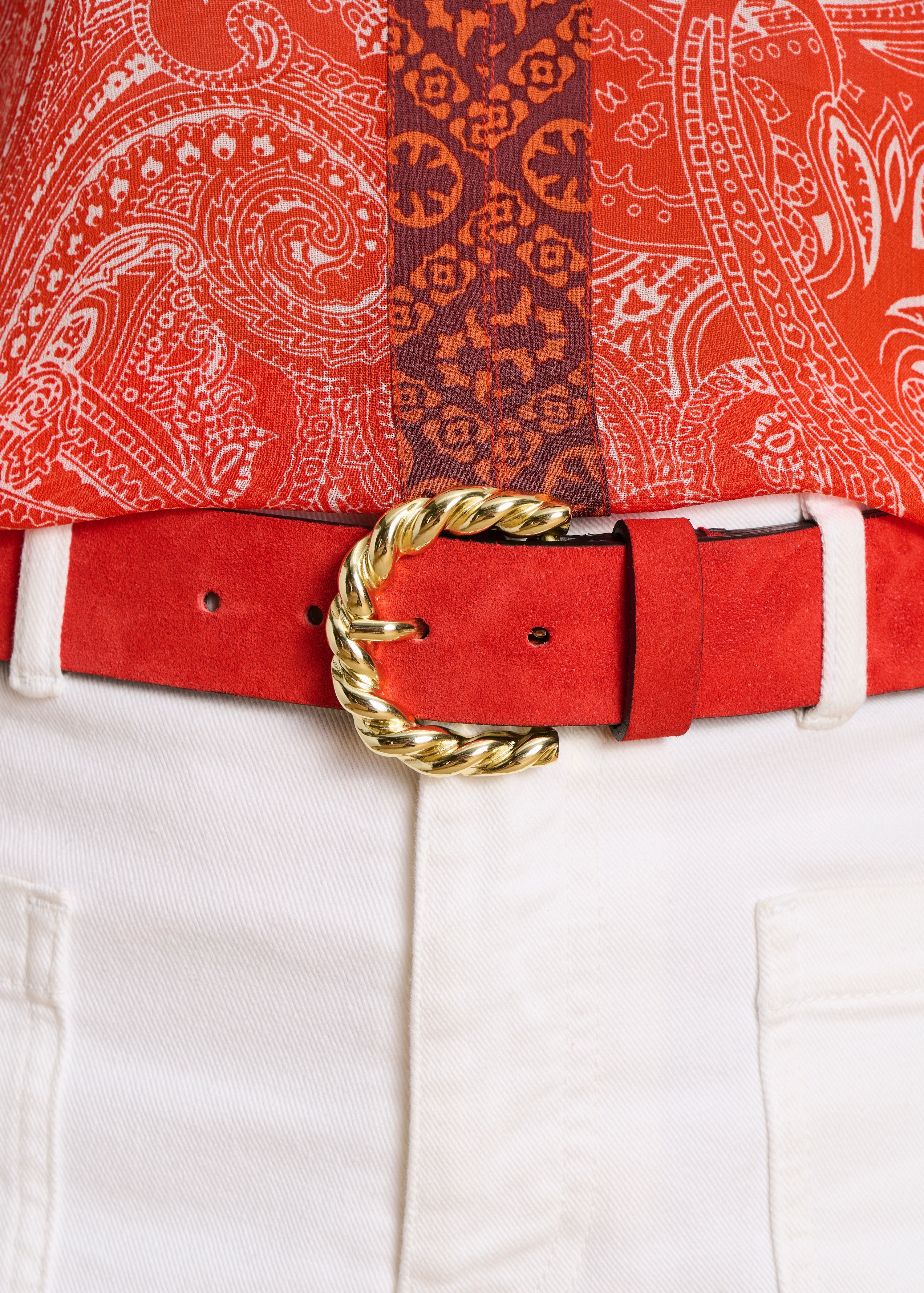 Ceinture orange en cuir boucle twistée