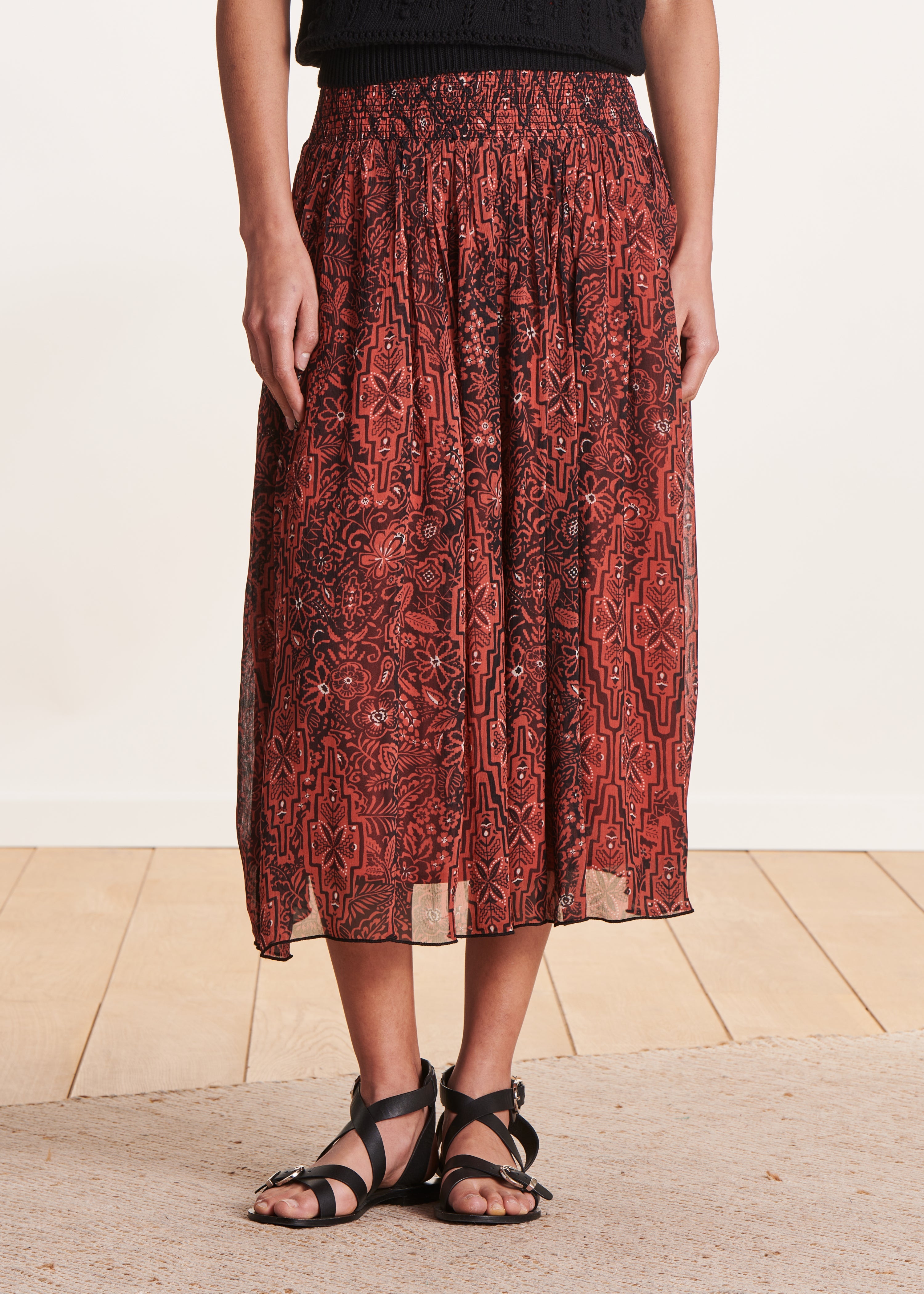 Jupe mi-longue ample marron à imprimé