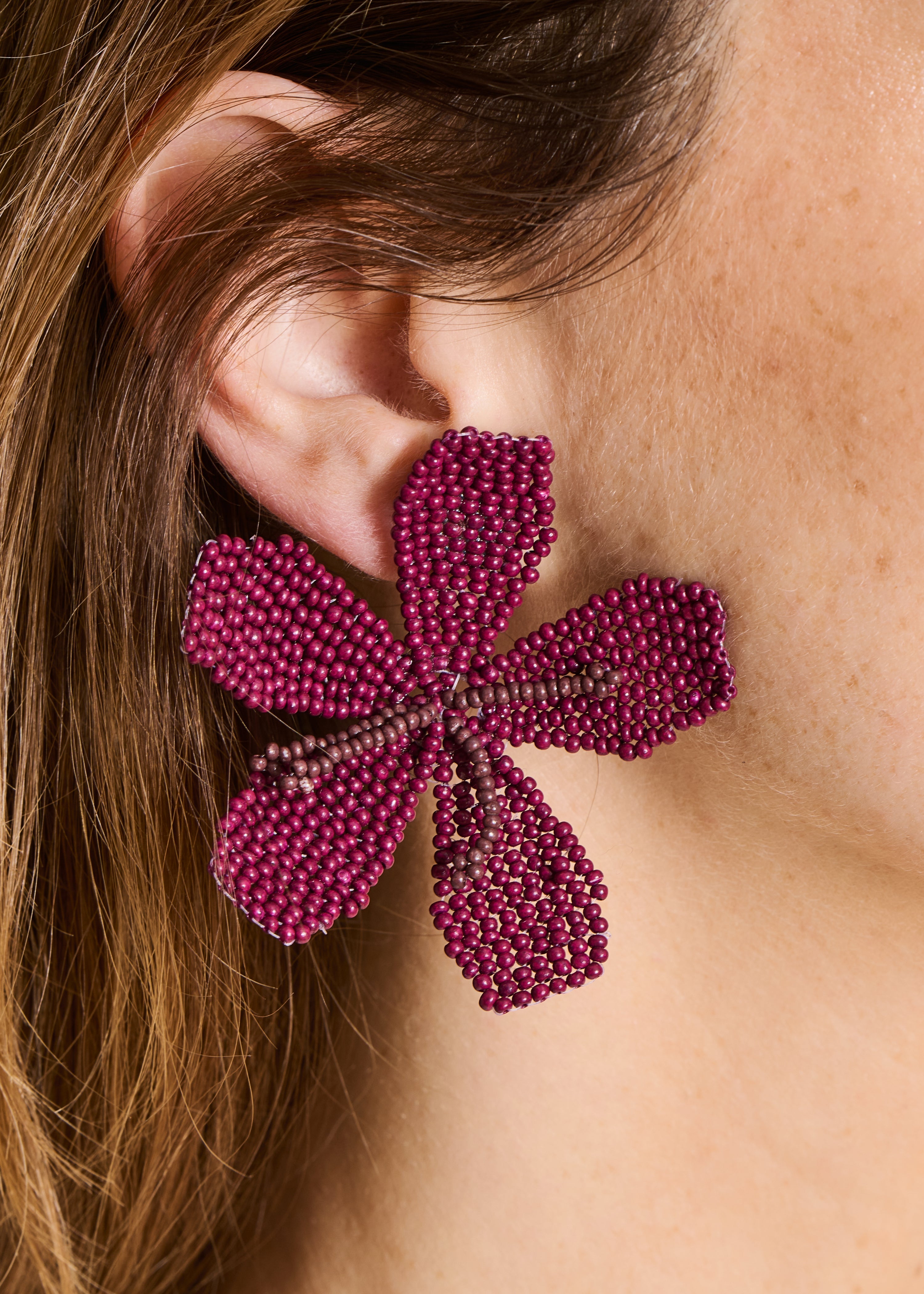 Boucles d'oreilles fleur en perles violettes