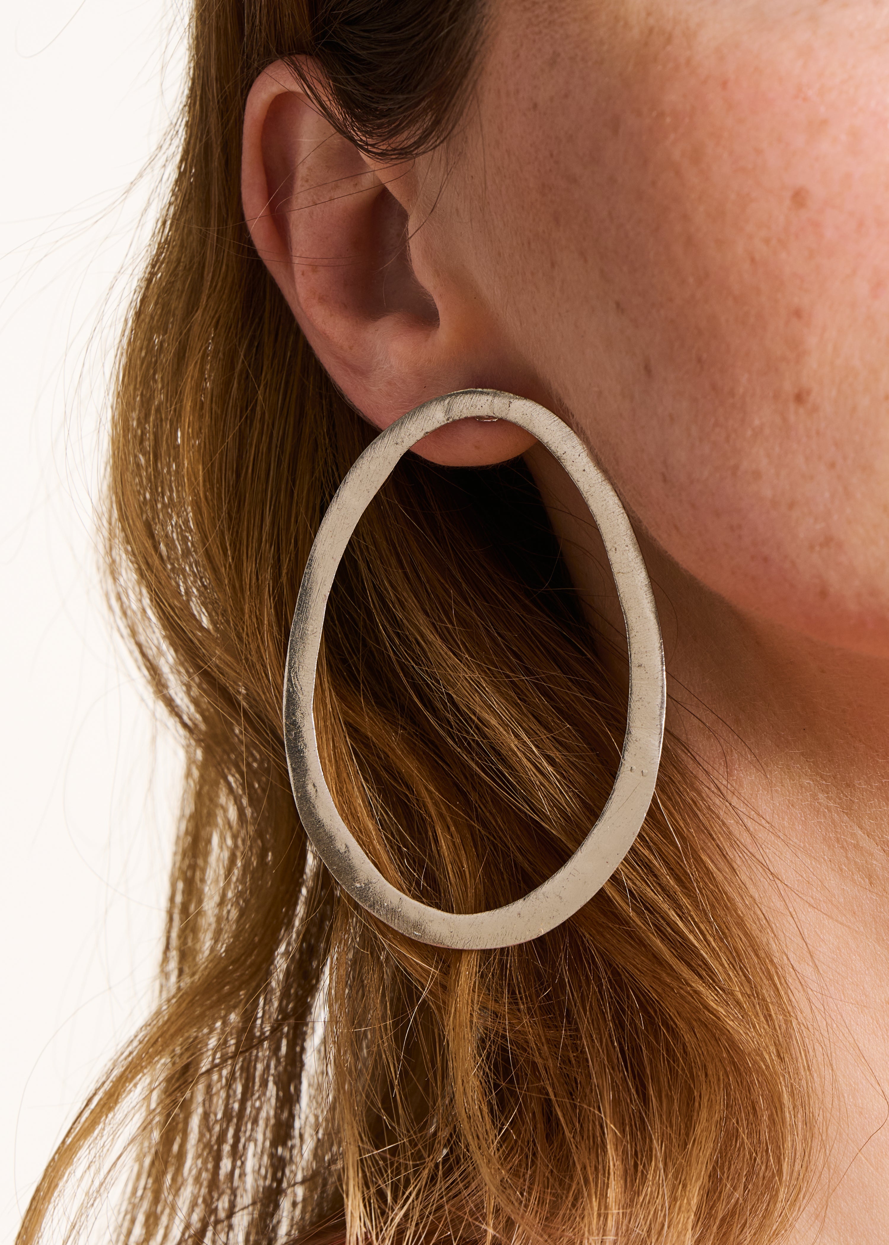 Boucles d'oreilles pendantes argentées