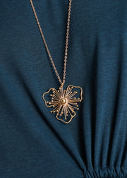 Collier sautoir fleur doré