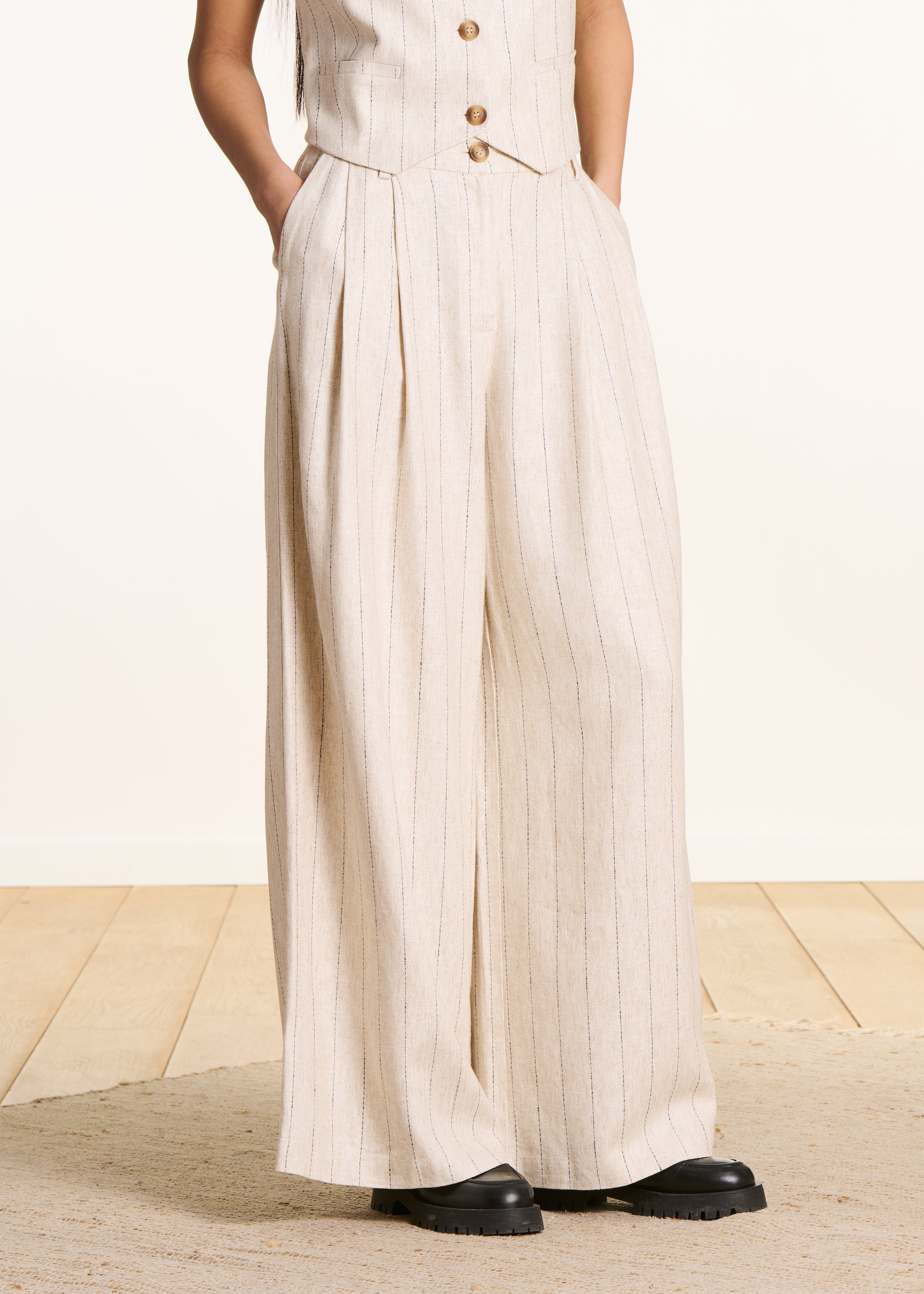 Pantalon large beige à rayures